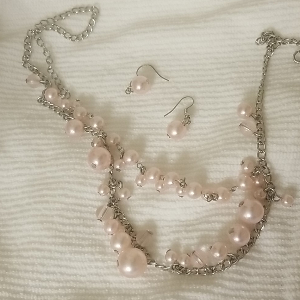 Beautiful pink pearl type necklace and earrings